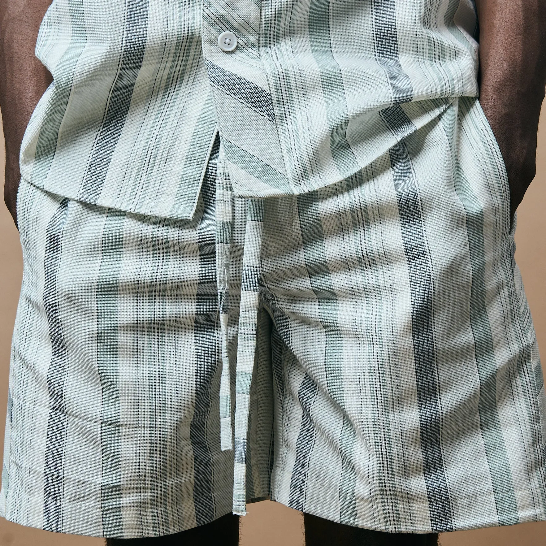 CROSS CUT STRIPE SHORTS